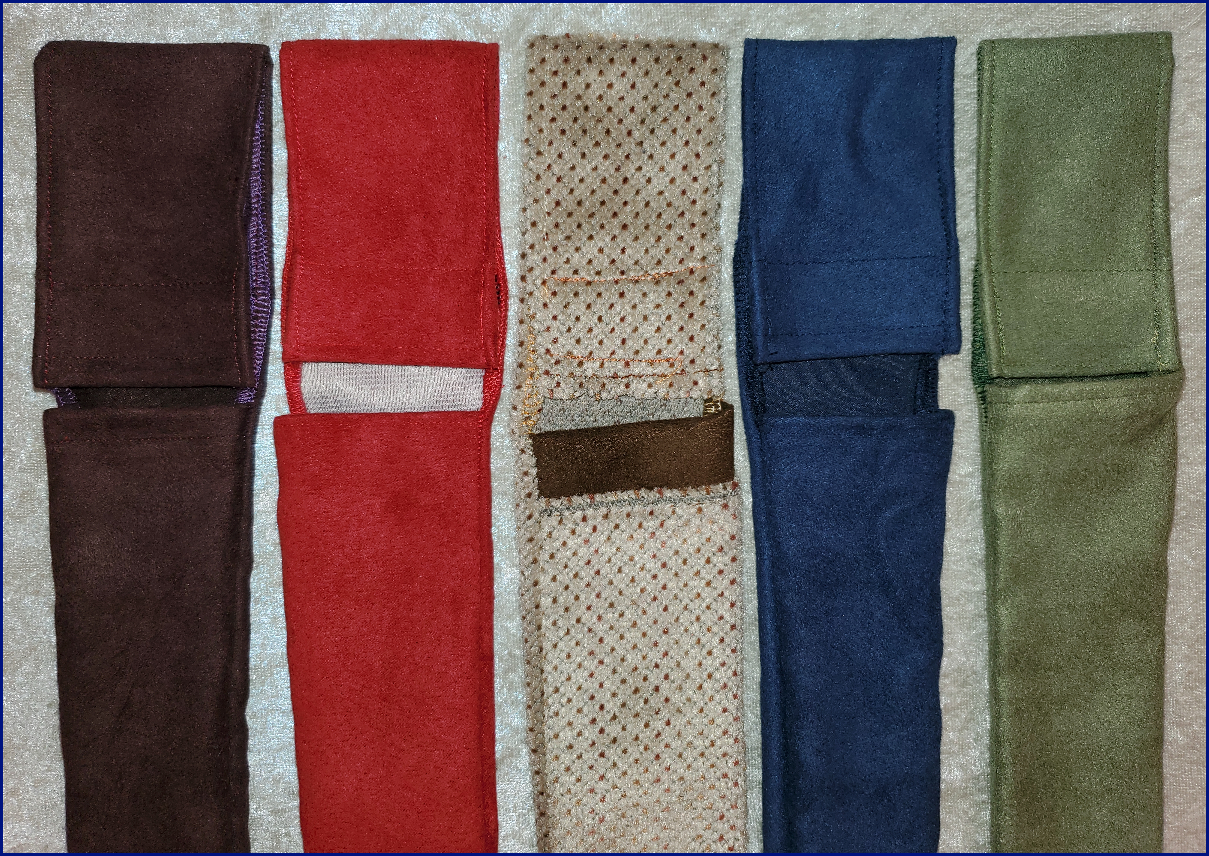 Fan Pouches in Wine Purple, Red, Brown Speckled Tan, Navy Blue, and Sage Green,